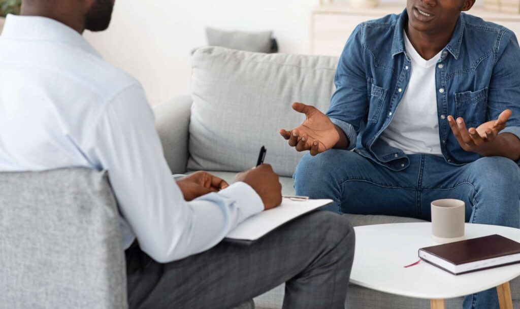two men talking anxiety therapy